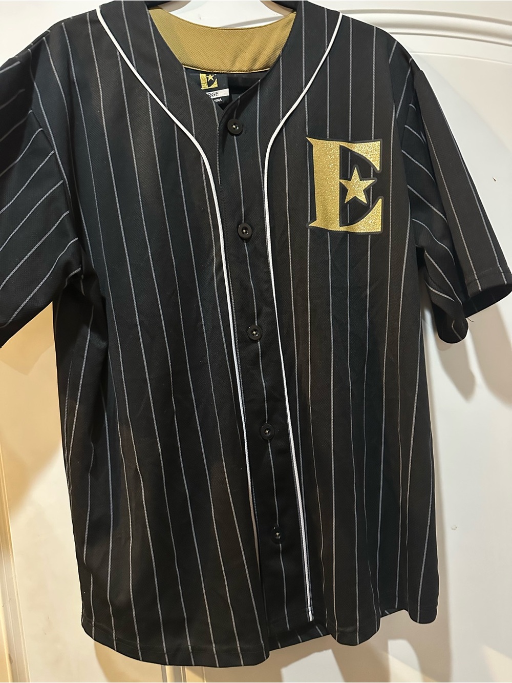 Black Pinstripe Baseball Jersey with Gold 'E' Chest Logo